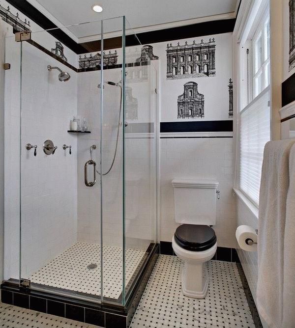 small bathroom with a shower cubicle and a toilet